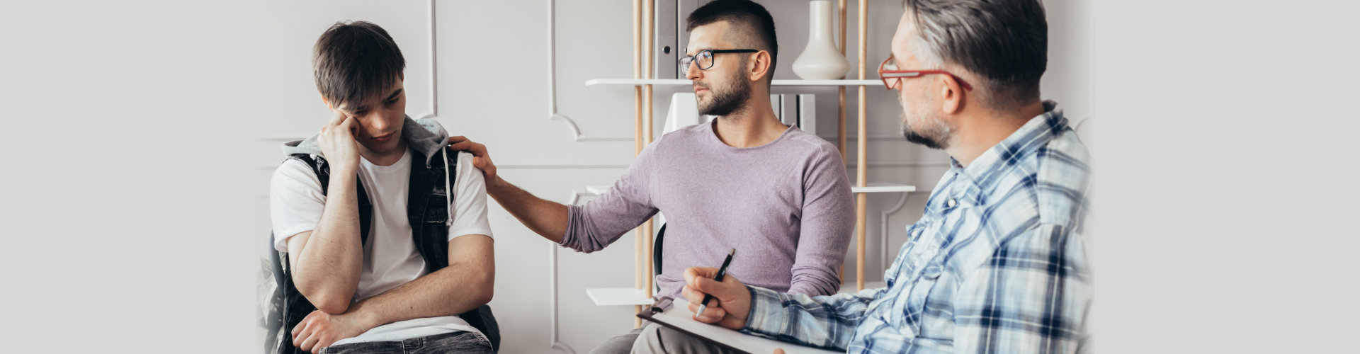 a man console the patent while in interview